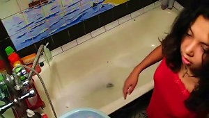 Brunette Masturbates In The Hot Tub.
