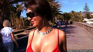 Busty Brunette Milf Flashes Her Round Jugs On A  Beach