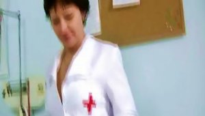 Sexy Milf In Nurse Uniform Stretching
