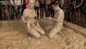 Leather-clad Brunette With A Sexy Body Having A Catfight In A Mudbath